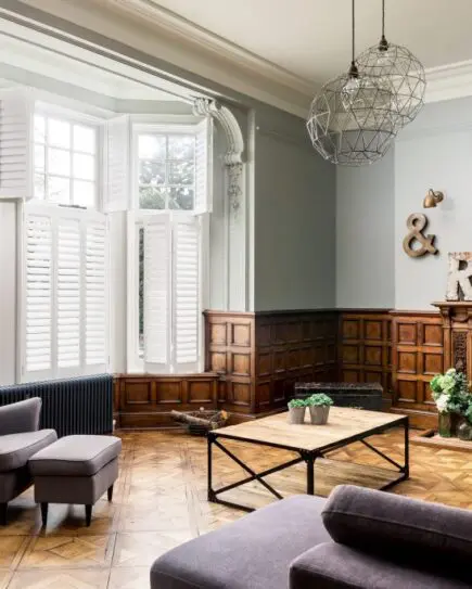 tier on tier white living room shutters