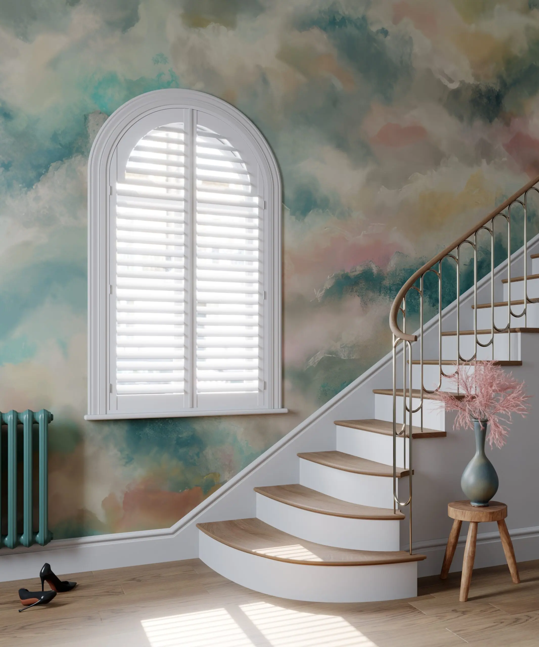 White made-to-measure plantation shutter fitted to a custom arched window, with pastel wallpaper curved staircase
