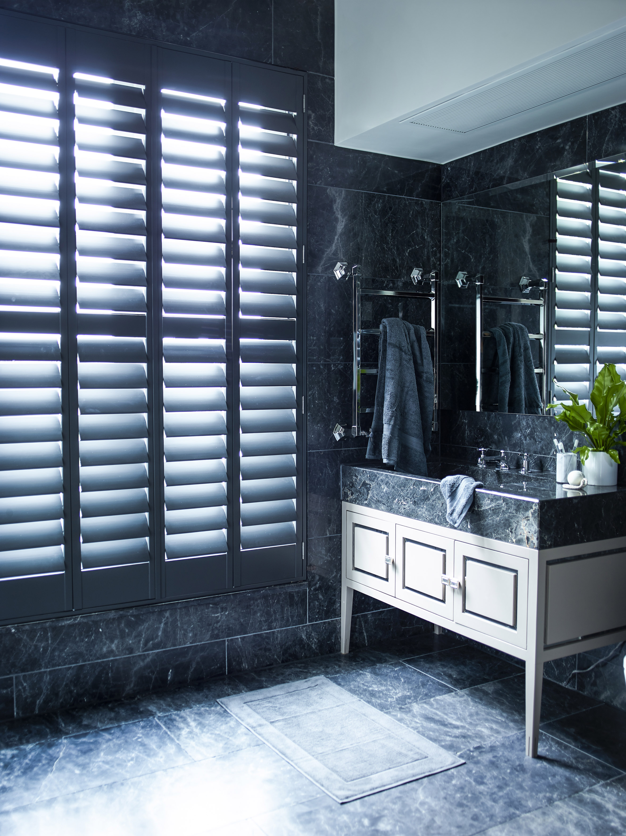 Dark bathroom shutters