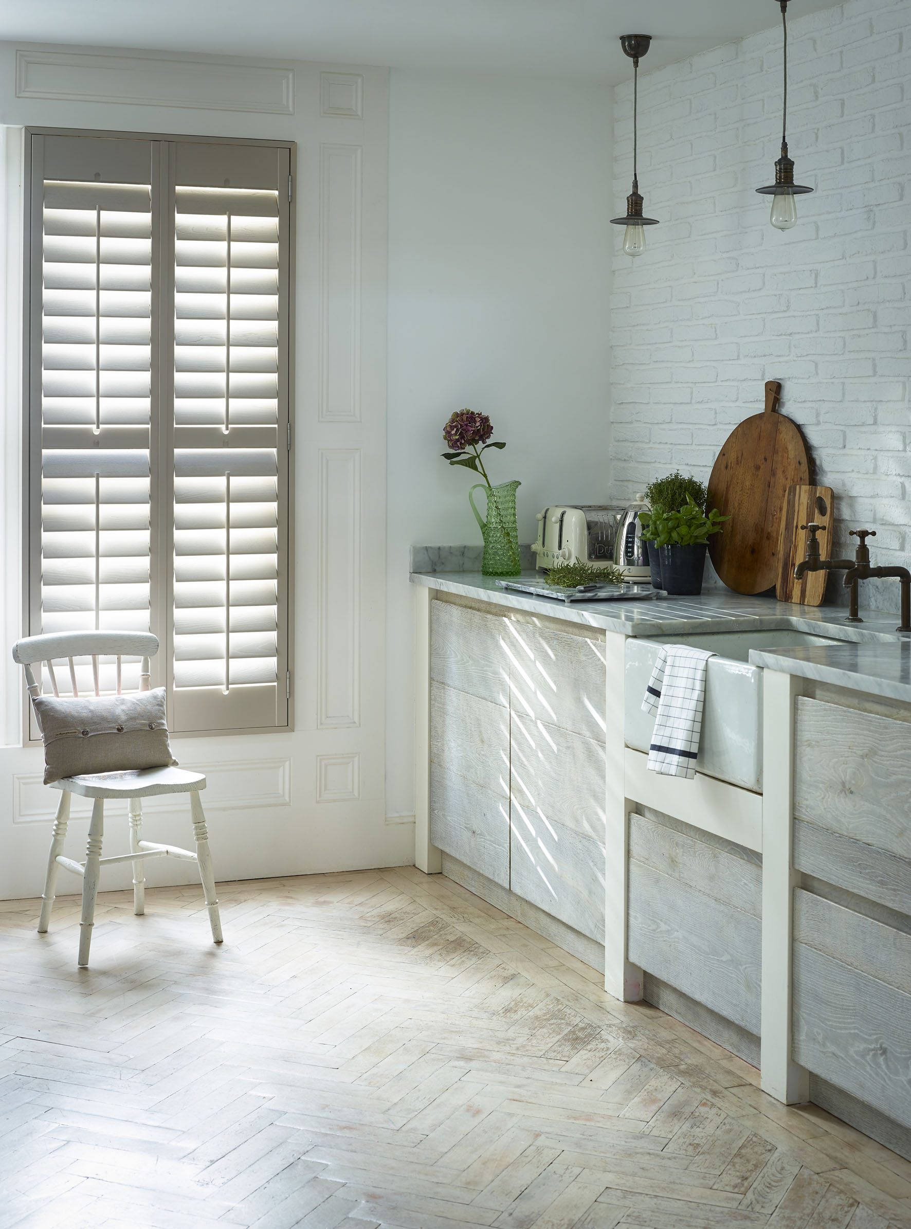 Dove full height shutters in modern kitchen