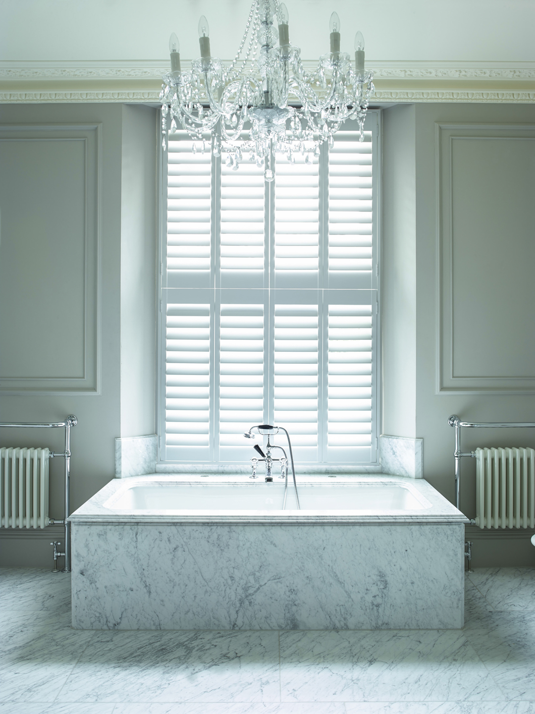white shutters in white bathroom by Shutterly Fabulous
