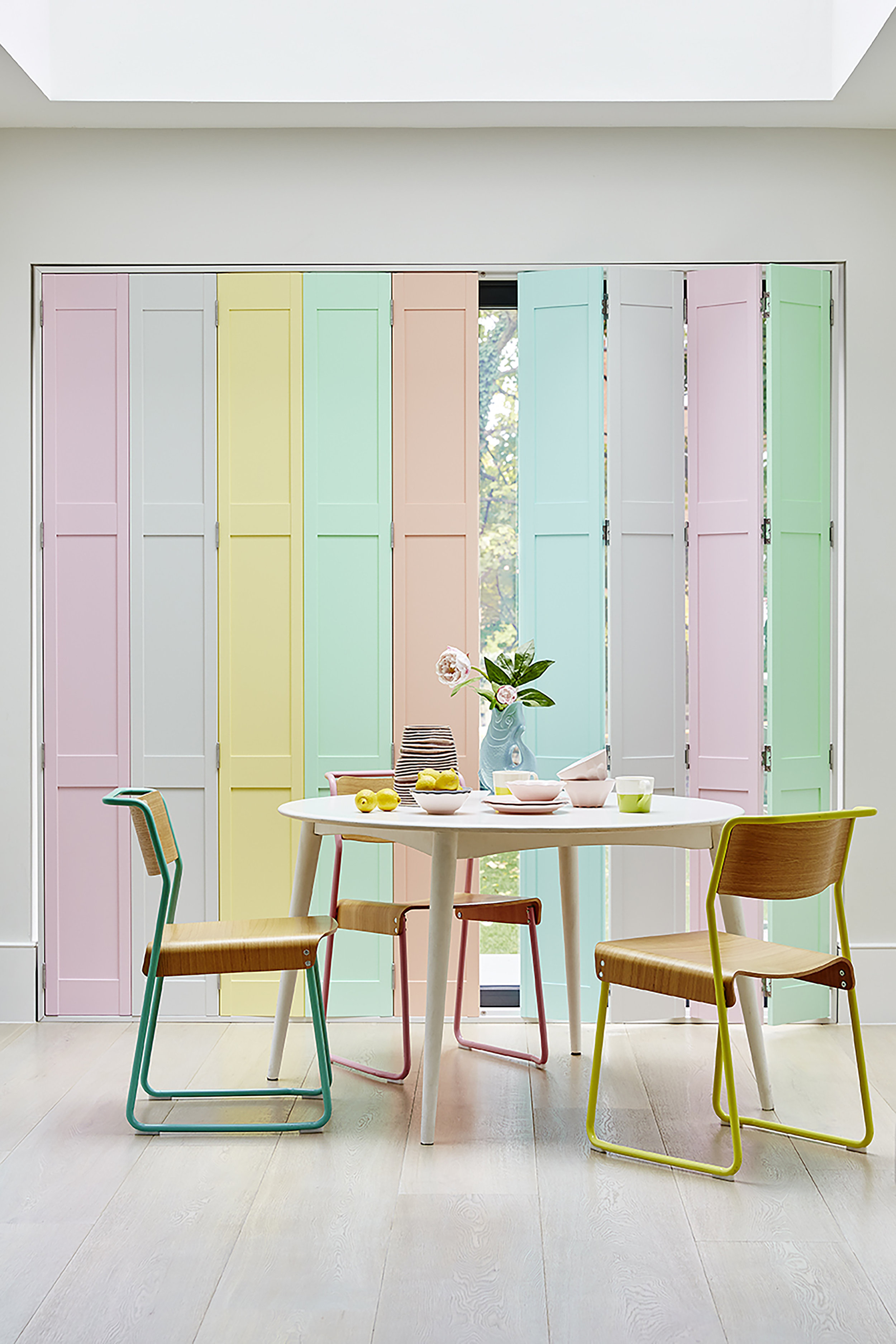 Custom multi-tone full solid shutters in a modern kitchen