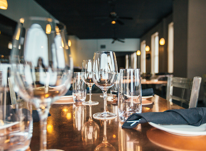 Restaurant table set with glasses