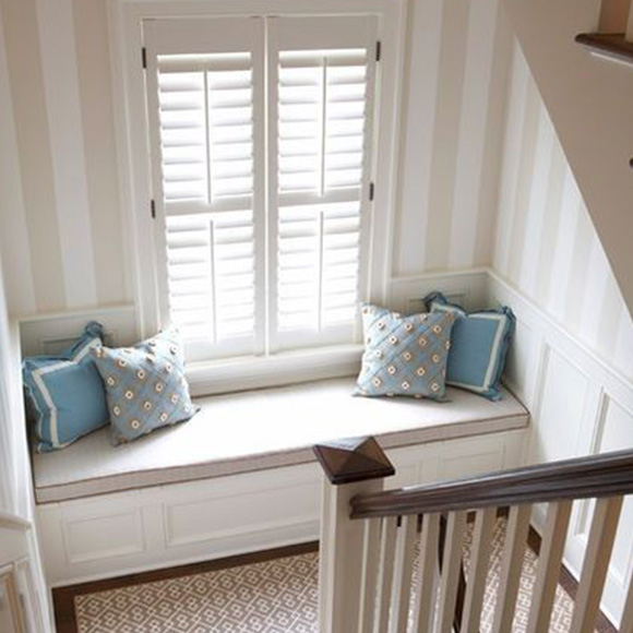 Full height shutters in window seat by Shutterly Fabulous