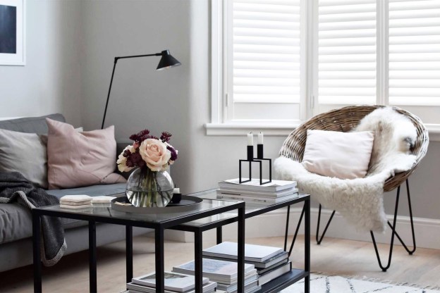 living room with white shutters 