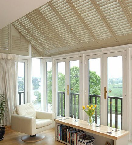 Conservatory roof fitted with plantation shutters