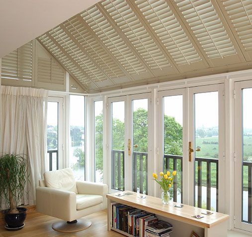 Conservatory roof fitted with plantation shutters