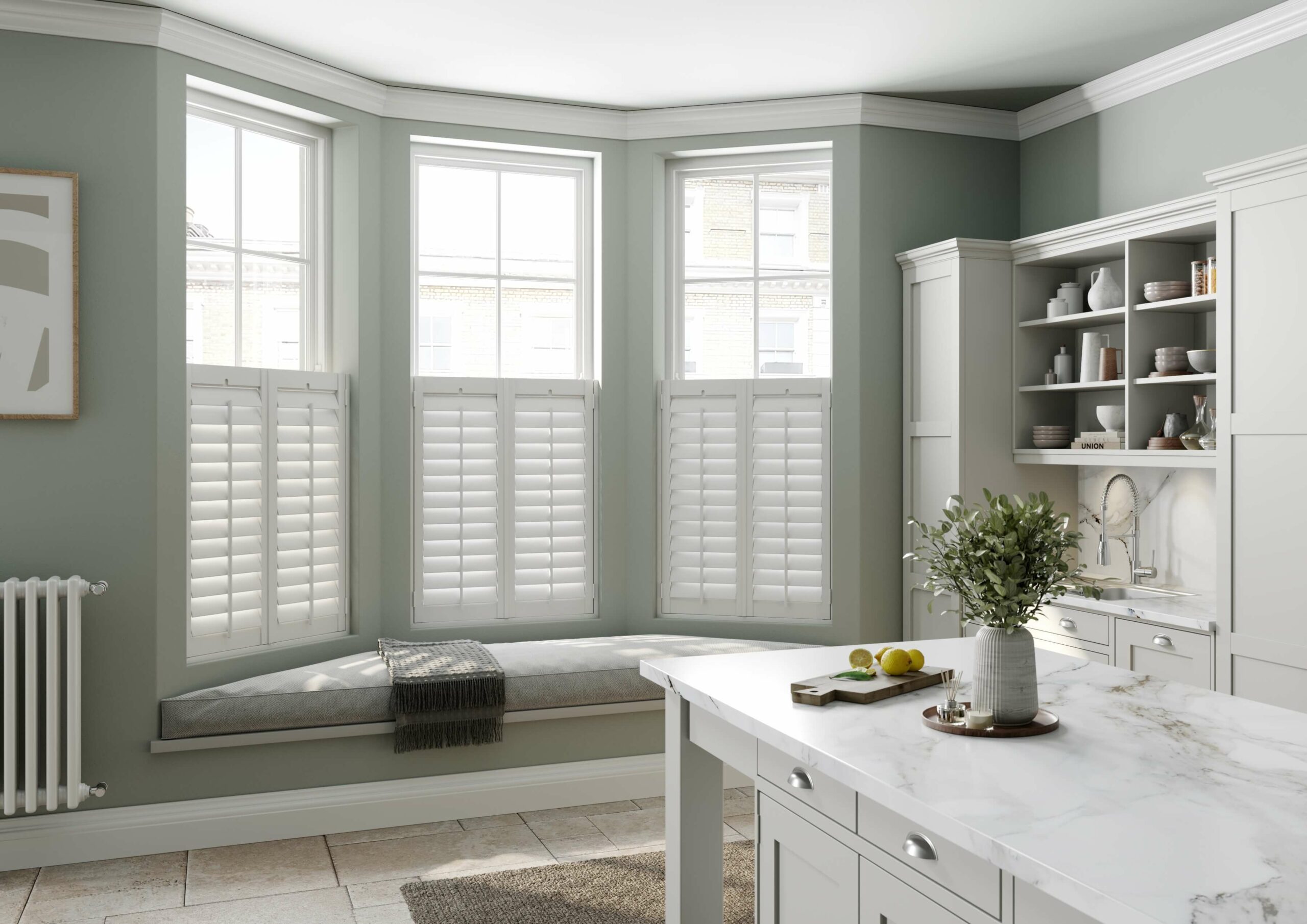 Cafe style window shutters in living room bay window