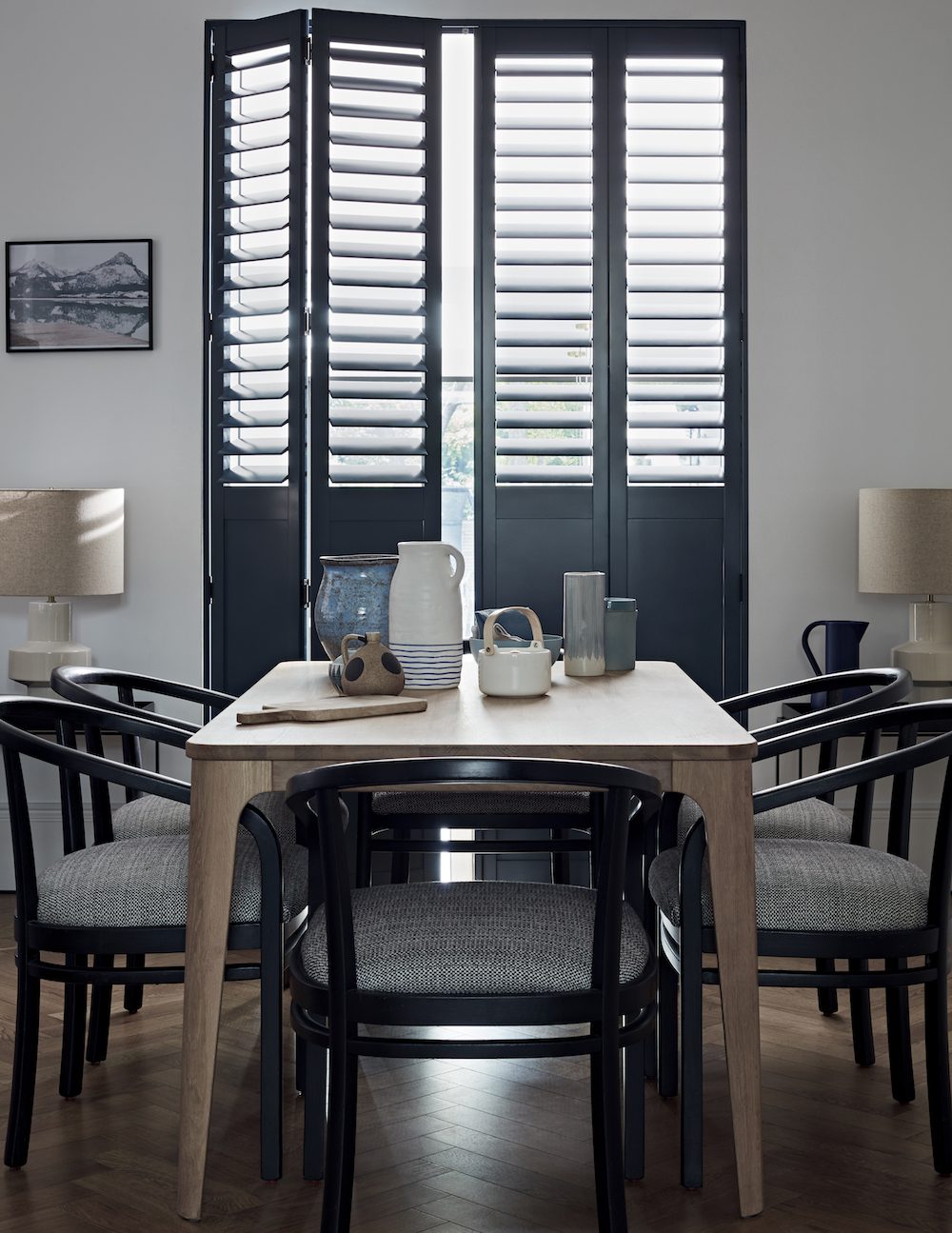 Dark shutters in dining room