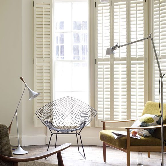thin white full height shutters with multiple panels