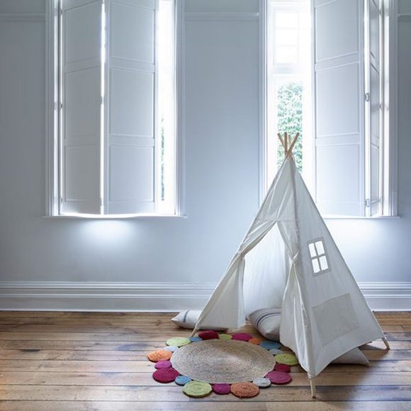 White sold wood shutters in kids play area