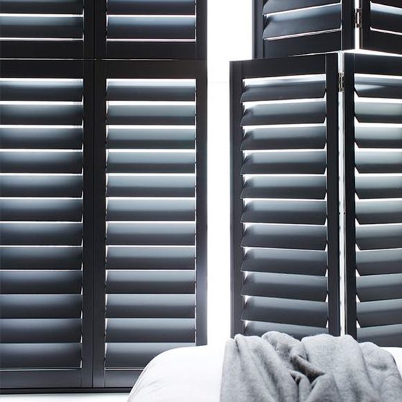 Tier on tier brown shutters open