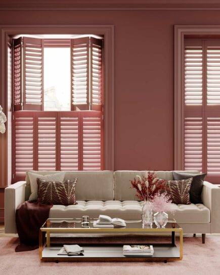 pink tier on tier living room shutters