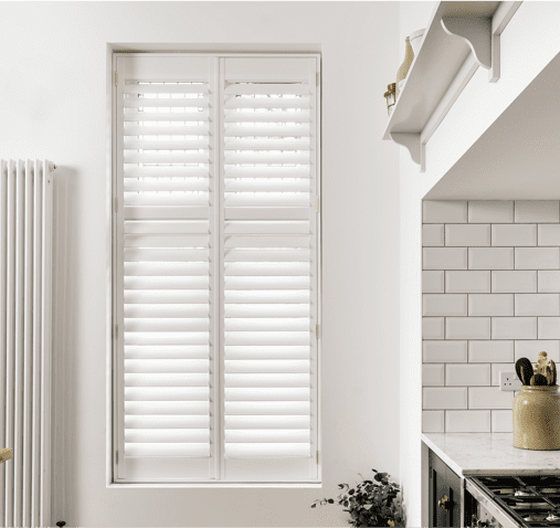 full height kitchen shutters divided with a thin mid rail
