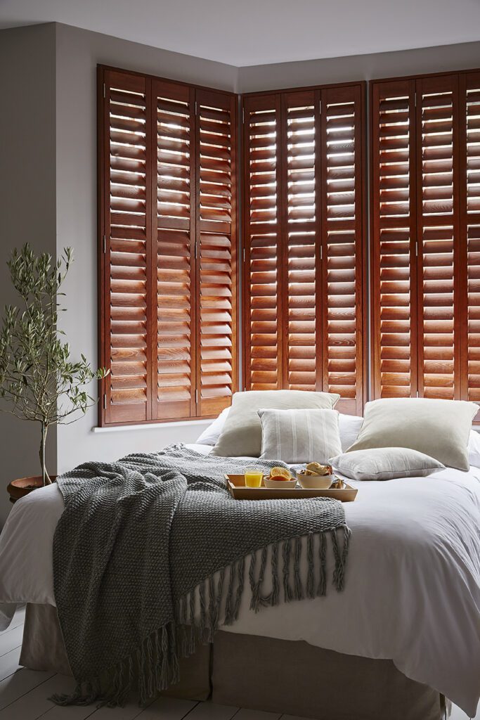 cherry wood stained full height shutters