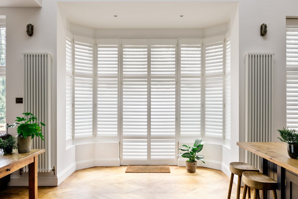 white full height window and door shutters