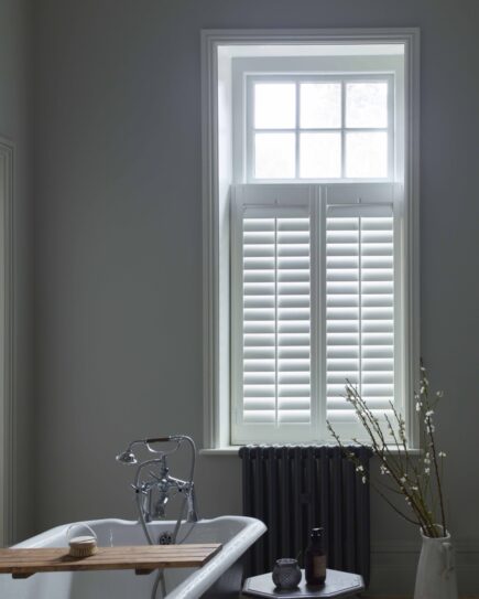 cafe style shutters shown in bathroom