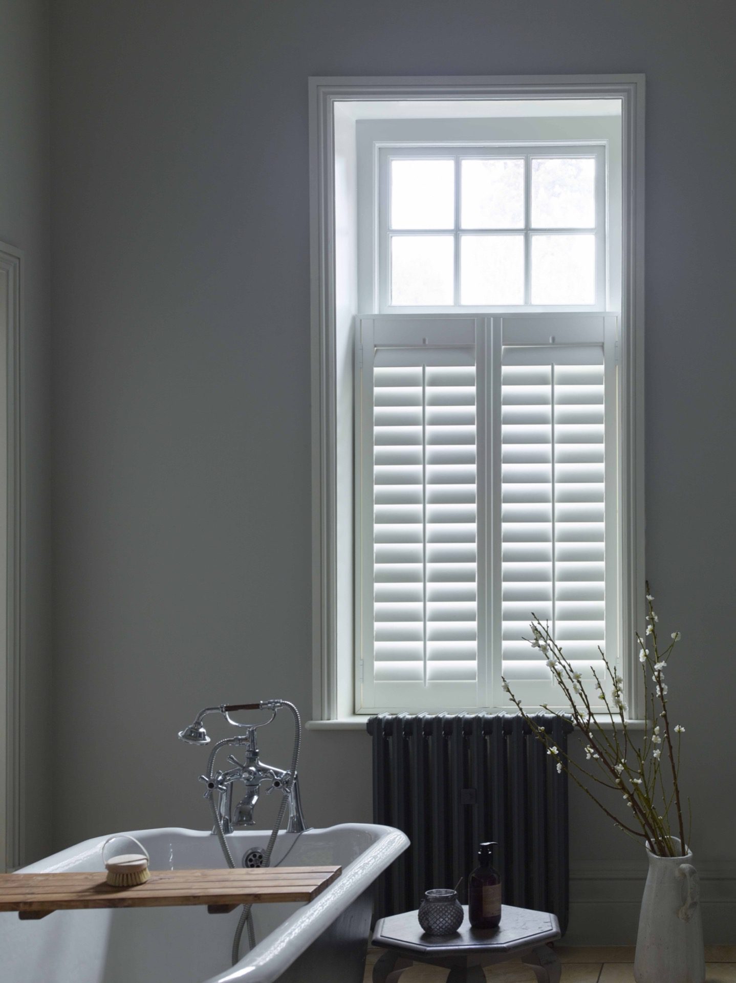 cafe style shutters shown in bathroom