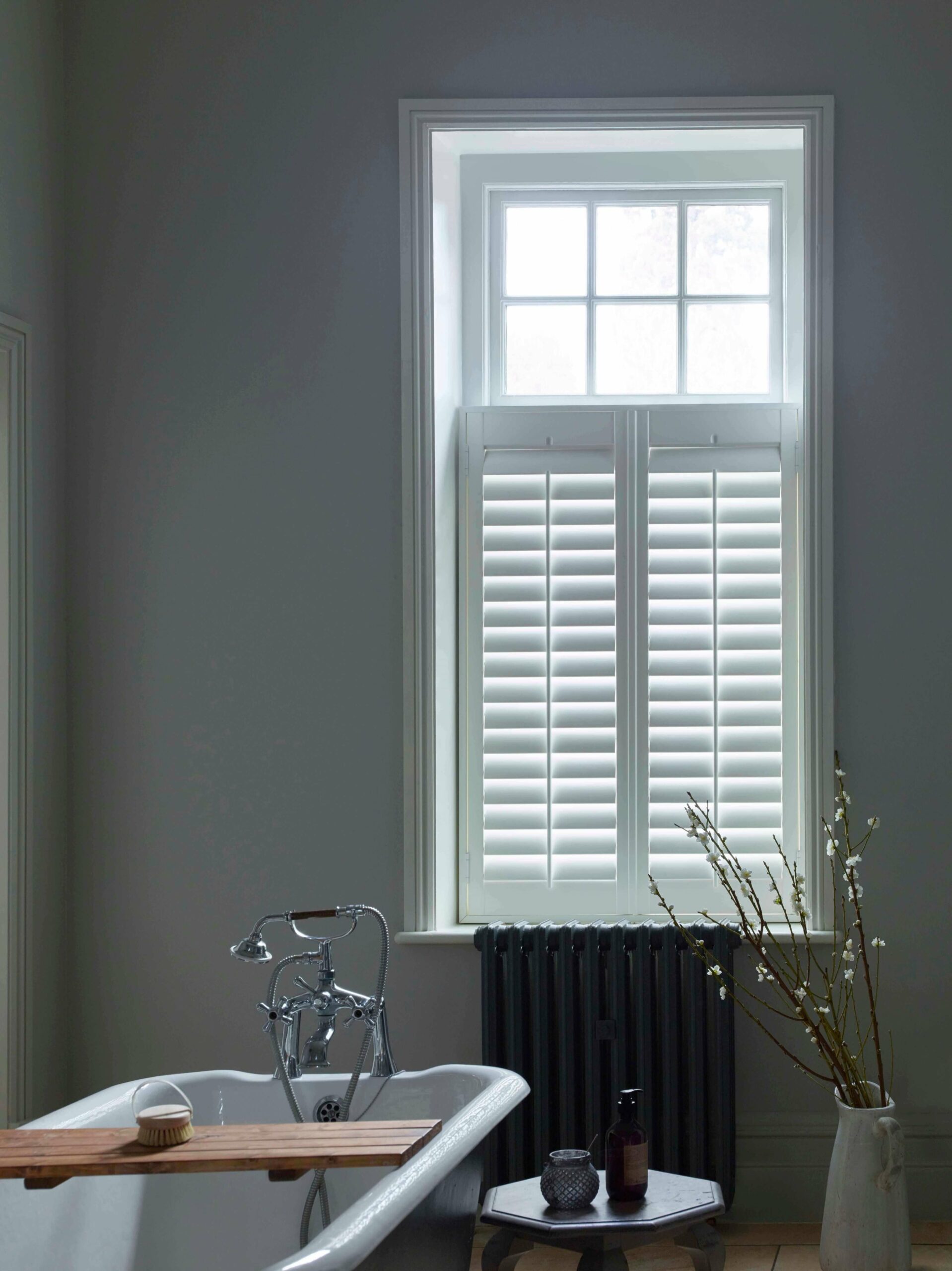 Window shutters in bathroom