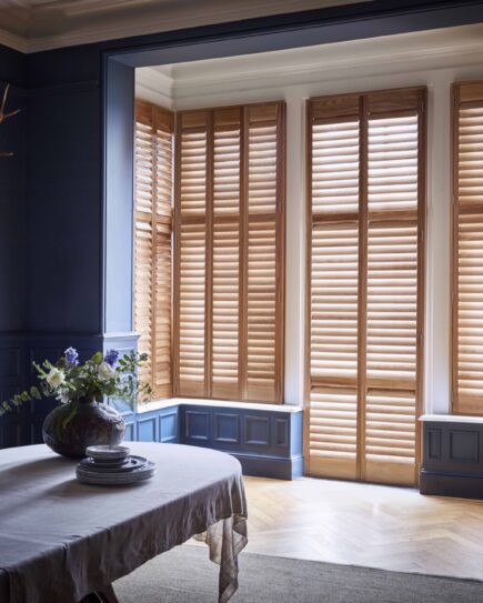 full height wooden shutters in the living room