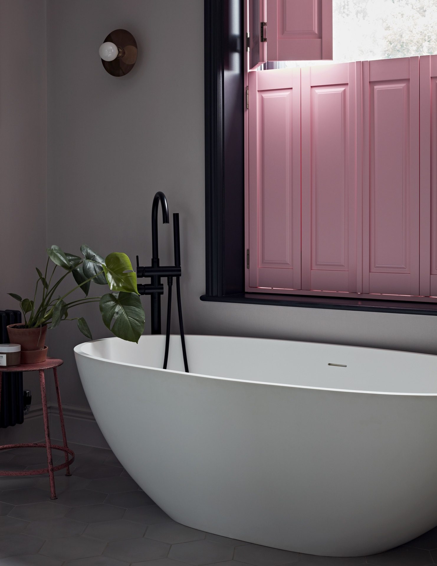 pink hardwood shutters in the bathroom