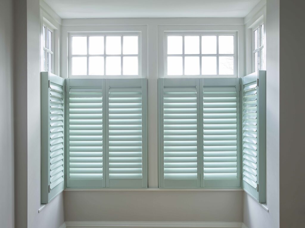 pale blue shutters in a window