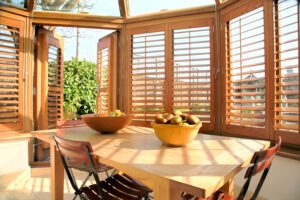 Wooden finish conservatory window shutters